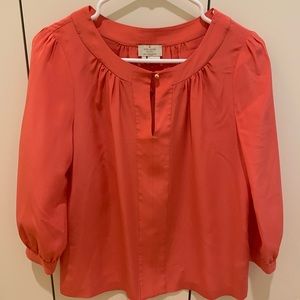 Kate Spade coral silk blouse, size 4.
